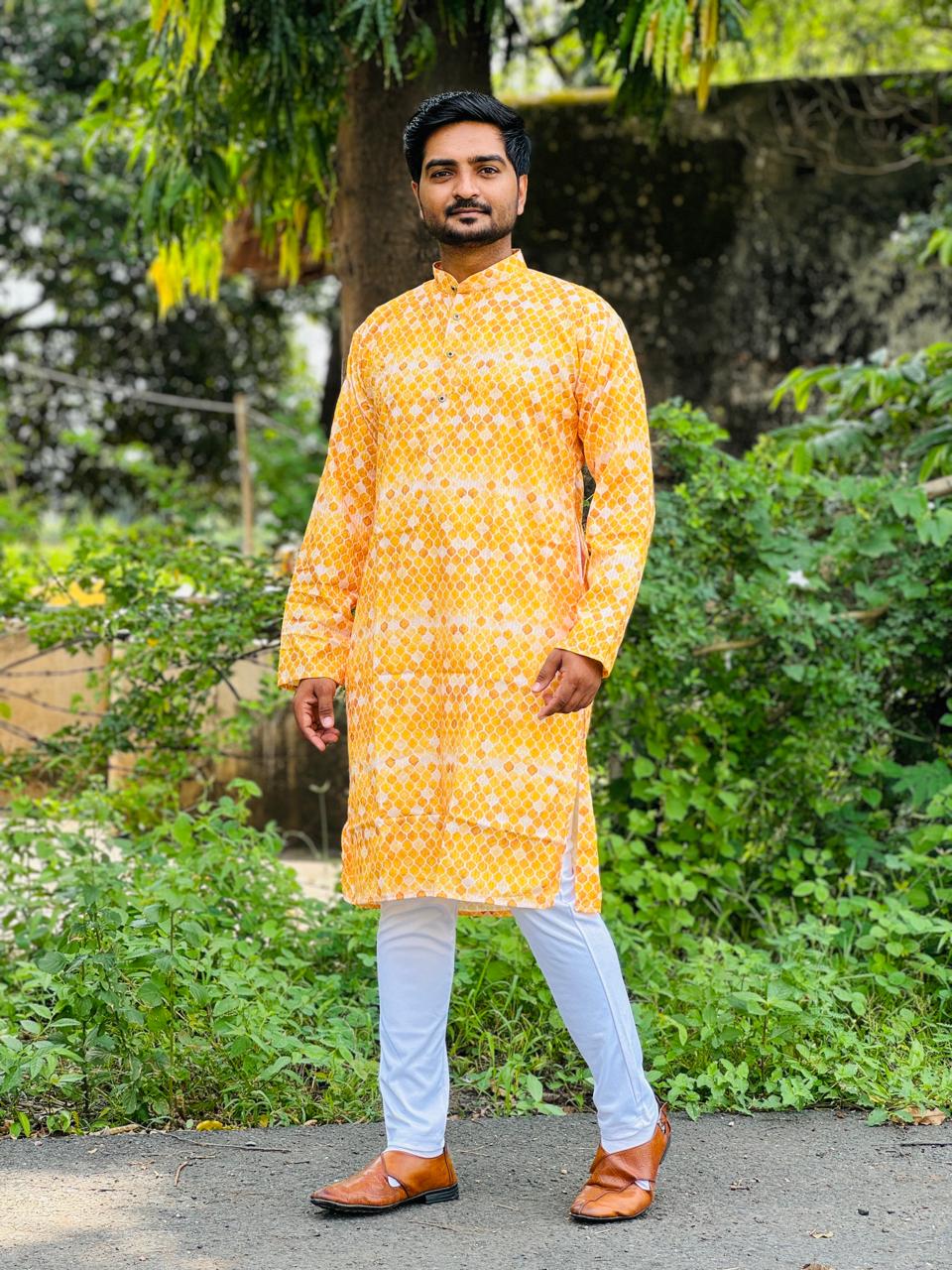 Embroidery work with Digital Print Cotton Kurta in Gold Color.