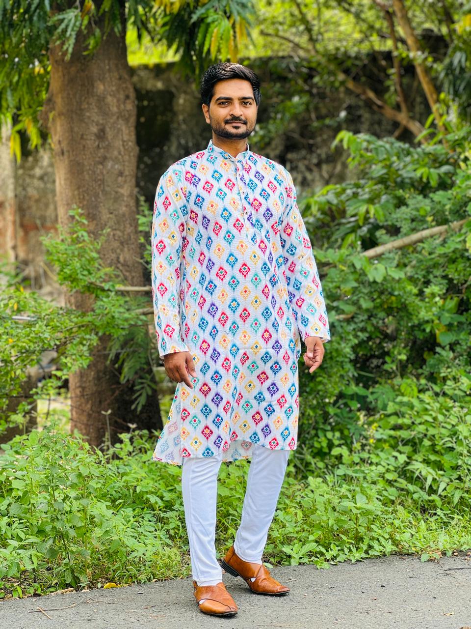 Embroidery work with Digital Print Cotton Kurta in Dark Muticolor.